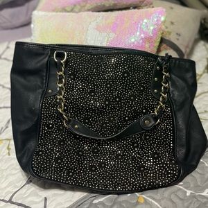 Carlos Santana purse